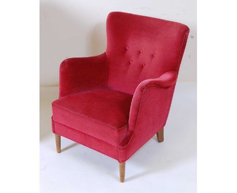 A Danish 1960s pink velvet velour buttonback armchair, raised on beech turned and tapering forelegs, w.66cmCondition report: 