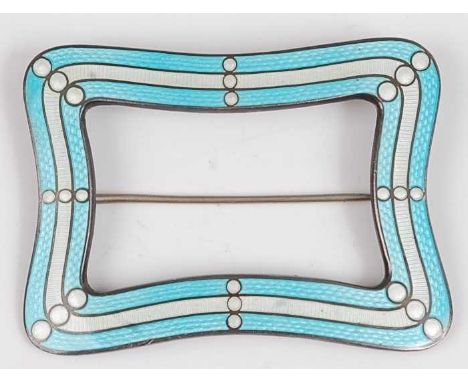 An Art Deco sterling silver and guilloche enamel decorated brooch, of rounded and pinched rectangular form, with openwork cen