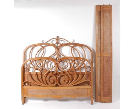 Attributed to Jacob &amp; Josef Kohn - an Austrian Secessionist curved bentwood and panelled double bed, the upper head and f