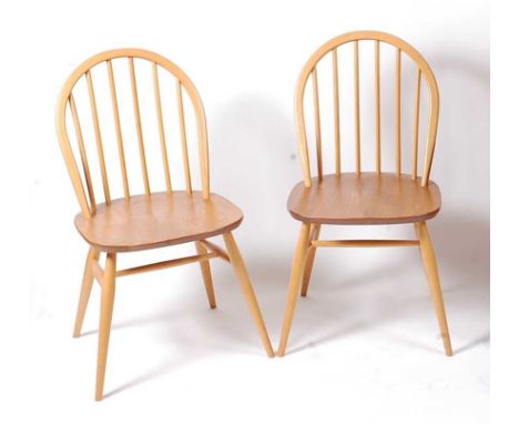 A pair of Ercol Windsor light elm stickback kitchen chairs, model number 370, w.42.5cm