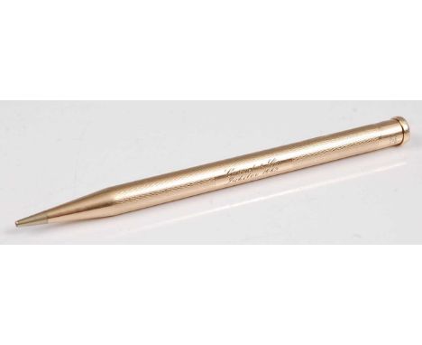 A mid-20th century 9ct gold Yard-O-Lead pencil, having engine turned decoration, engraved Cassel &amp; Co. Jubilee 1962, furt