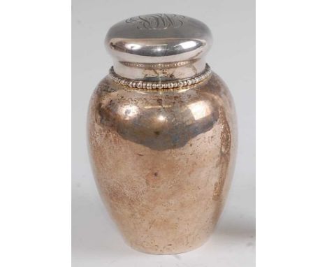 An early 20th century sterling silver tea-caddy and cover, by Shreve Crump &amp; Low, having etched monogrammed cover with be