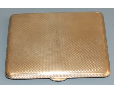 An Art Deco 9ct gold pocket cigarette case, having all-over engine turned exterior, the interior inscribed From Mollie 3rd Oc