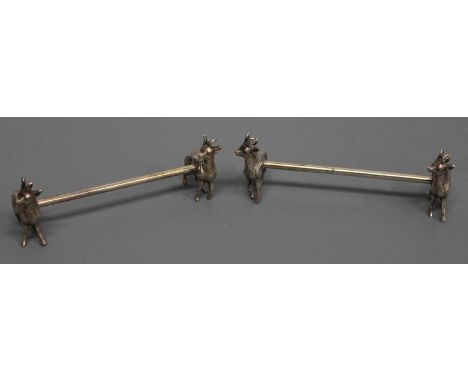 A pair of early 20th century WMF electroplated cutlery rests, each terminating on a standing roe deer, stamped WMF EP, each l