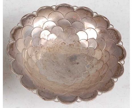 A 1930s silver circular pedestal bonbon dish, having raised fish-scale effect graduated inner decoration, maker Mappin &amp; 