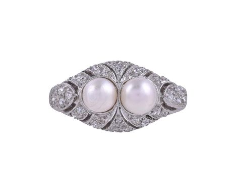 A 1920S DIAMOND AND PEARL DRESS RINGThe pierced marquise shaped panel set with eight cut diamonds, approximately 0.34 carats,