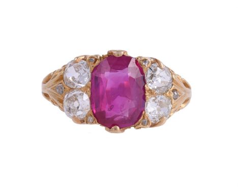 A VICTORIAN DIAMOND AND RUBY SEVEN STONE RING, BURMA, NO HEAT DATED 1869The oval cut ruby estimated to weigh 2.20 carats tota
