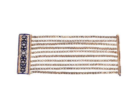 A ROSE CUT DIAMOND AND ENAMEL BRACELET The rectangular panel clasp centred with rose cut diamond flowerheads between pierced 