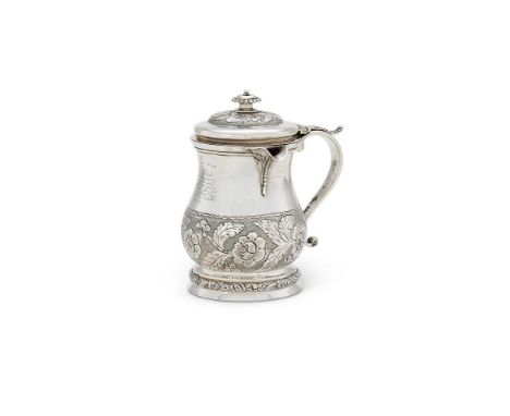 AN INDIAN COLONIAL SILVER BALUSTER LIDDED TANKARDTWENTYMAN & CO., CIRCA 1835With a domed and gadrooned finial to the floral c