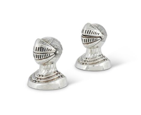 A PAIR OF VICTORIAN SILVER NOVELTY PEPPER POTS MODELLED AS KNIGHT'S HELMETSGEORGE UNITE & SONS, BIRMINGHAM 1876With a hinged 