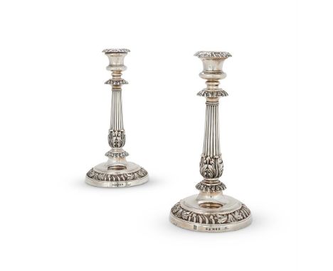 A PAIR OF GEORGE IV SILVER CANDLESTICKSMATTHEW BOULTON, BIRMINGHAM 1821The circular sconces gadrooned and chased with foliage