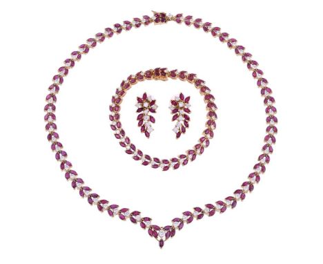 AN EARLY 1980S 18 CARAT GOLD, RUBY AND DIAMOND NECKLACE, BRACELET AND EAR PENDANT SUITE The necklace with graduated links set