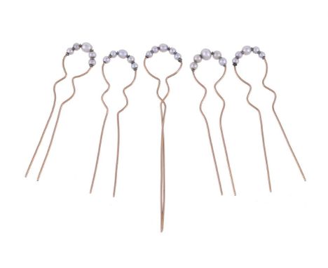 FIVE EARLY 20TH CENTURY PEARL HAIR PINS CIRCA 1910The gold coloured pins each with five graduated pearlsSize/dimensions: one 