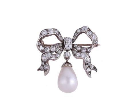 A VICTORIAN DIAMOND BOW BROOCH WITH ASSOCIATED NATURAL PEARL DROPThe gold backed silver bow set throughout with graduated min