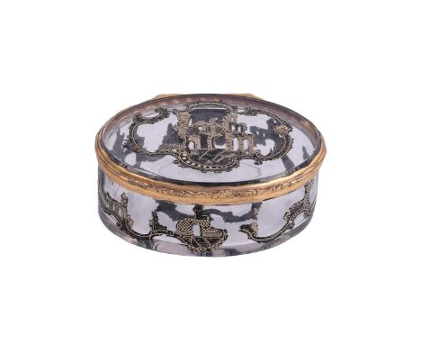 AN 18TH CENTURY GILT MOUNTED GLASS BOX The cover with applied resin classical architectural structures and a band to the body
