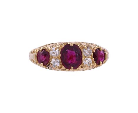A RUBY AND DIAMOND SEVEN STONE RINGThe graduated oval cut rubies interspaced by two pairs of eight cut diamonds, approximatel