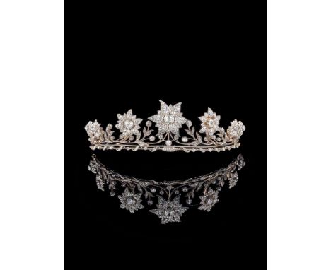 AN EARLY 20TH CENTURY CONVERTIBLE DIAMOND FLORAL TIARA/NECKLACE CIRCA 1910With seven graduated old mine cut diamond set gold 