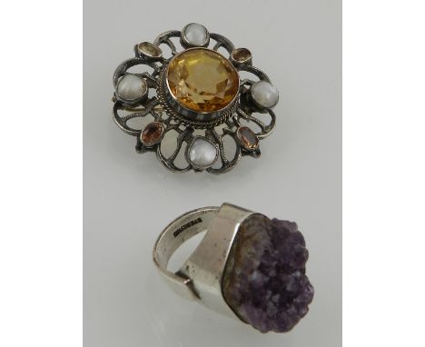 A white metal, citrine and pearl set flower head brooch, together with a white metal and rock crystal amethyst ring, stamped 