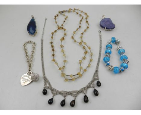 A quantity of costume jewellery, to include  two silver and agate pendants, two bracelets, a white metal and faux pearl neckl