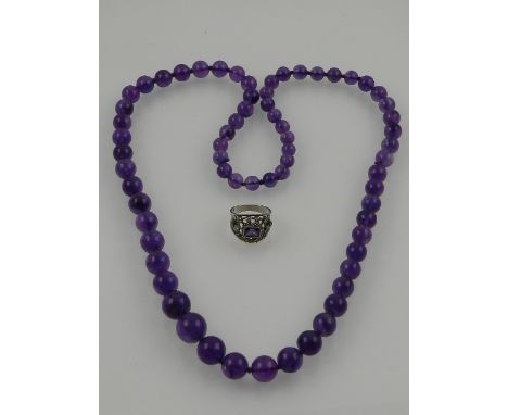 A amethyst beaded necklace, together with a white metal and amethyst dress ring