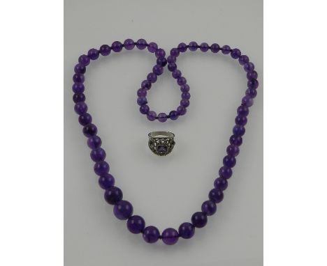 A amethyst beaded necklace, together with a white metal and amethyst dress ring