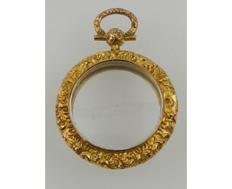 A yellow gold double sided portrait pendant. 