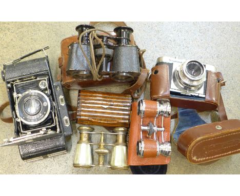 A Voigtlander VitoB camera, a pair of field glasses, two pairs of opera glasses including mother of pearl, a Kodak folding ca
