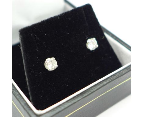 A pair of 18ct white gold and diamond stud earrings, total diamond weight 0.36ct