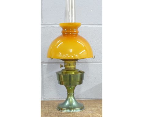 An oil lamp, marked 23 Aladdin