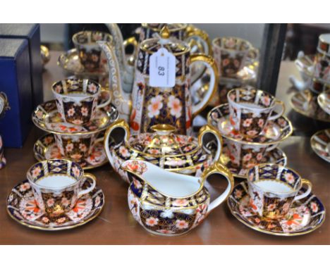 A Royal Crown Derby 2451 pattern coffee set, for six, comprising coffee pot, cups and saucers, sucrier and milk jug  Conditio