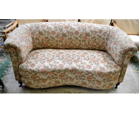 An early 20th century kidney shaped two-seat sofa, 172cm wide