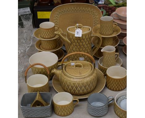 Danish Kronjyden tea, coffee and dinnerware, including teapot with cane handle, pattern in relief, designed by Jens Quistgaar