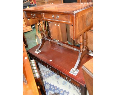 A reproduction flame mahogany sofa table; a similar coffee table (2)