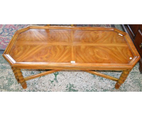 A Drexel Chartwell coffee table, chamfered rectangular top, bobbin 'turned' supports, X-stretcher, bun feet, 133cm long