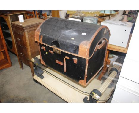A canvas and leather mounted dome topped trunk  AF