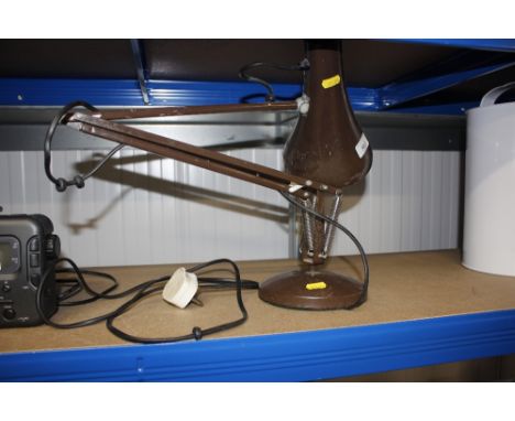 An angle poise type lamp