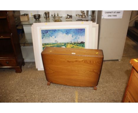 An Ercol drop leaf coffee table 