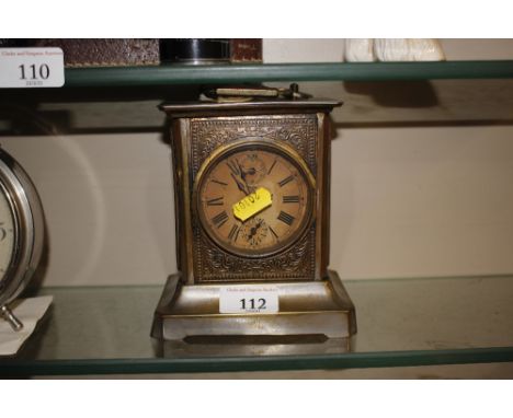 An early 20th Century carriage type clock with spring driven movement  AF