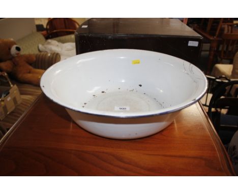 A white enamel wash bowl