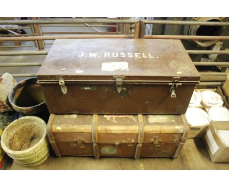 A metal trunk; and a wooden and canvas bound trunk  AF