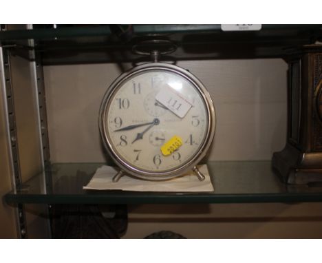A Goliath chrome cased repeater alarm clock; together with a written letter stating that "This clock was in my cab for three 