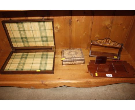An inlaid wooden musical trinket box; small carved wall shelf; a wall hanging notepad holder and an oak box with fabric lined