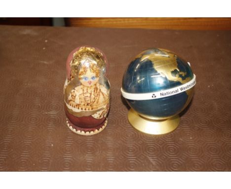 A set of Russian birch bark nesting dolls; and a 1970's Nat West globe piggy bank