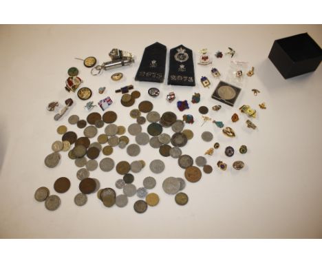 A quantity of various old coins; a collection of lapel badges, policeman's whistle and epaulettes; and another whistle 