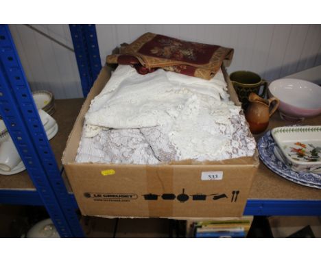 A box of various lace and textiles 