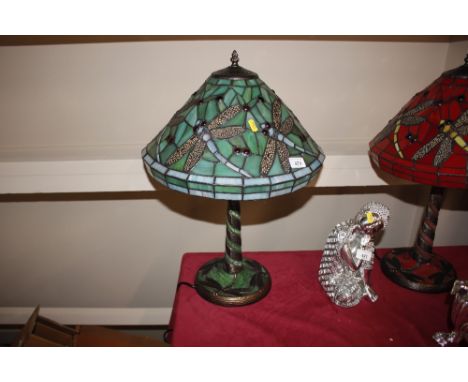 A Tiffany style green dragonfly decorated table lamp