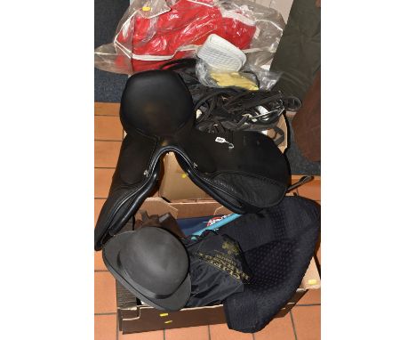 TWO BOXES AND LOOSE EQUESTRIAN ACCESSORIES TOGETHER WITH A BLACK LEATHER SKELTON SADDLE, comprising a Nick Skelton jump saddl