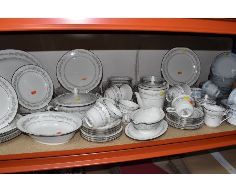 A NORITAKE IVORY CHINA 'PARKRIDGE' PATTERN DINNER SET, comprising one oval meat plate, twelve dinner plates, twelve side plat