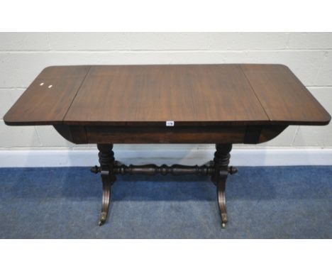 A REGENCY AND LATER ROSEWOOD DROP LEAF SOFA TABLE, with a single frieze drawer, raised on turned supports, and shaped legs, w