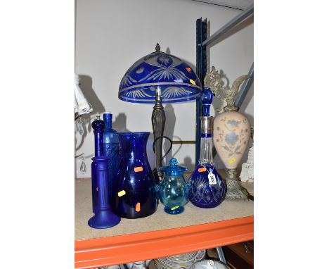 A GROUP OF BLUE GLASS ITEMS AND A LAMP, a vintage art nouveau/deco style table lamp, cobalt blue cut to clear glass dome shad